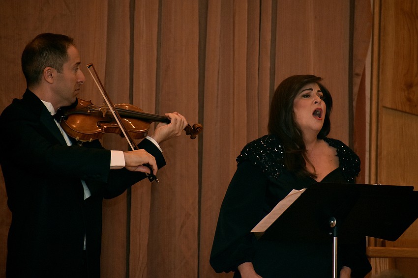 Daniel Jordan, concert master of the Sarasota Orchestra accompanies Robyn Rocklein, a soloist with the orchestra, during her performance of “Élégie.”
