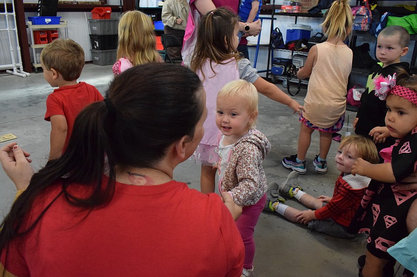 Preschoolers find great seats in the front row.