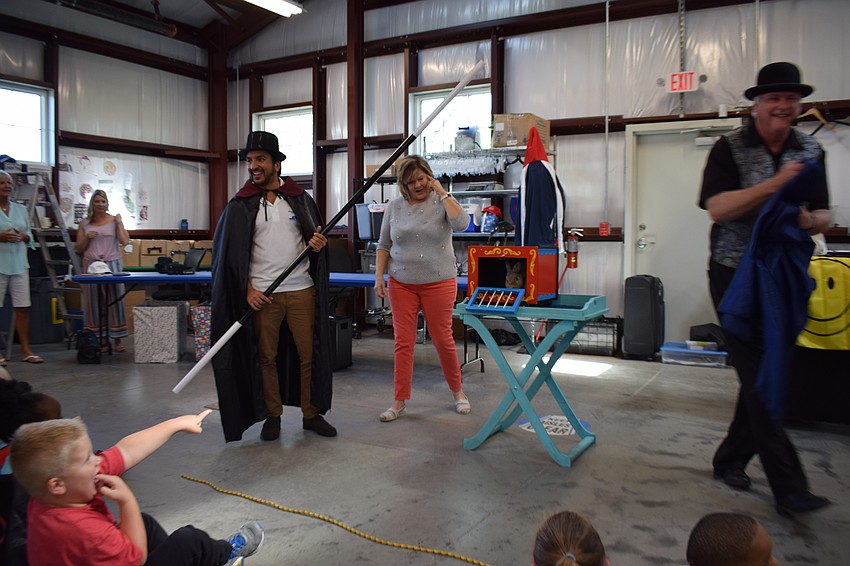 Azam Rangoonwala tries his hand at being a magician with the help of Jeff Lovett.