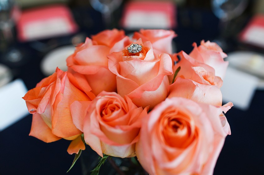 The room was decorated with coral roses.