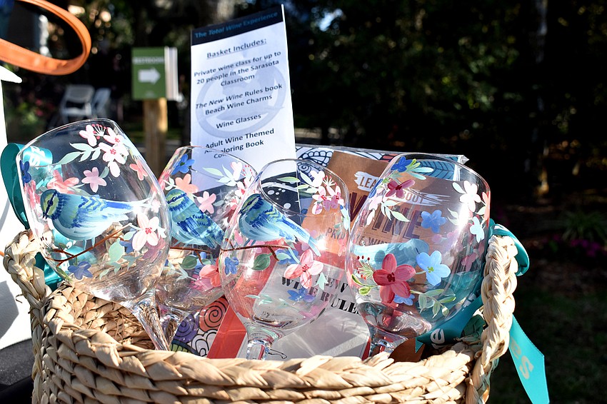 Silent auction items included wine baskets, signed baseballs and other items.