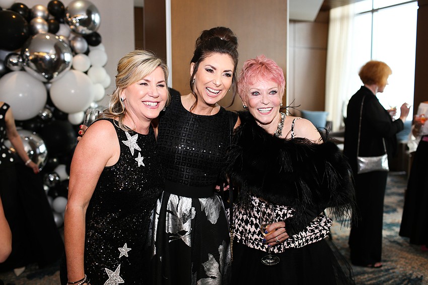Tammy Karp, Donna Koffman and Elisabeth Waters pose for a photo.