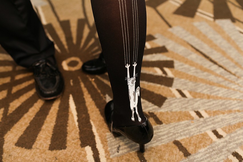 Dee Boenau shows off her cat leggings.