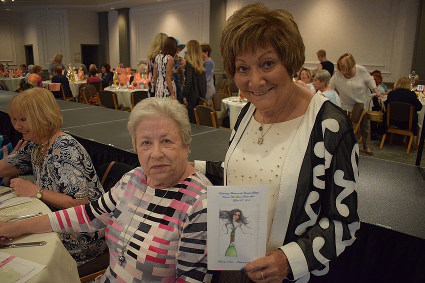 Friends Ruth Friedman and Carole Friedman (no relation) enjoy each other's company prior to the meal.