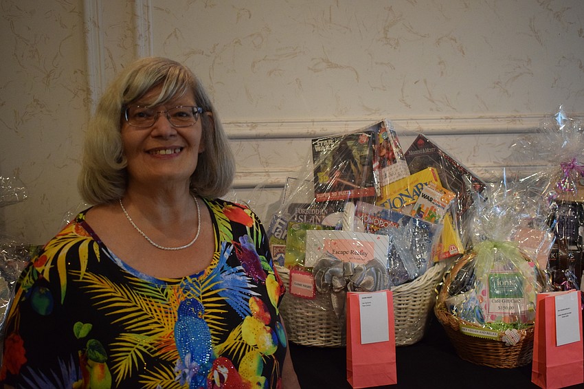 Jan Santoro helped put some of the many gift baskets together.