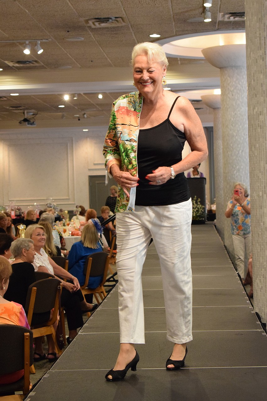 Joan Scott was a fan favorite in each trip down the runway, showing shoulder and throwing out winks.