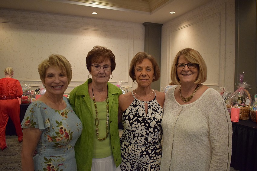 Model chair Olga Kelley, Women's Club of Cascades co-president Graze Beezie, fashion show chair Marilyn Swanson, and co-president Betty Vogel worked hard to make the show possible.