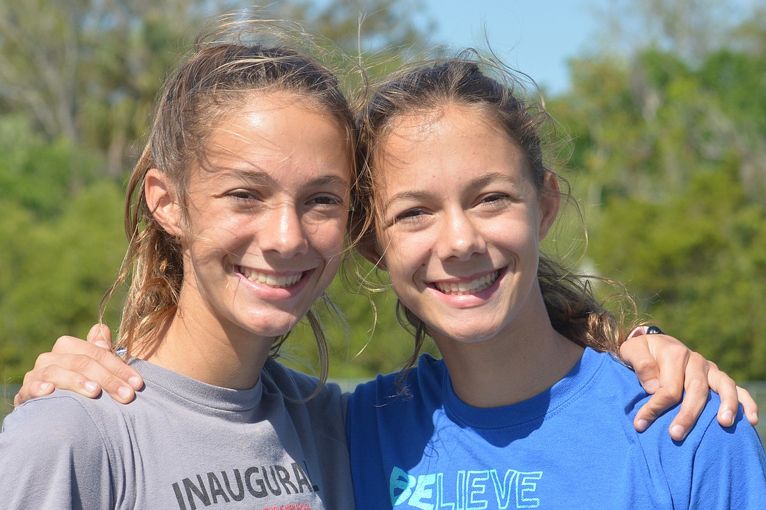 Gracie and Hailey Marston are identical twins and freshmen runners at Braden River High.