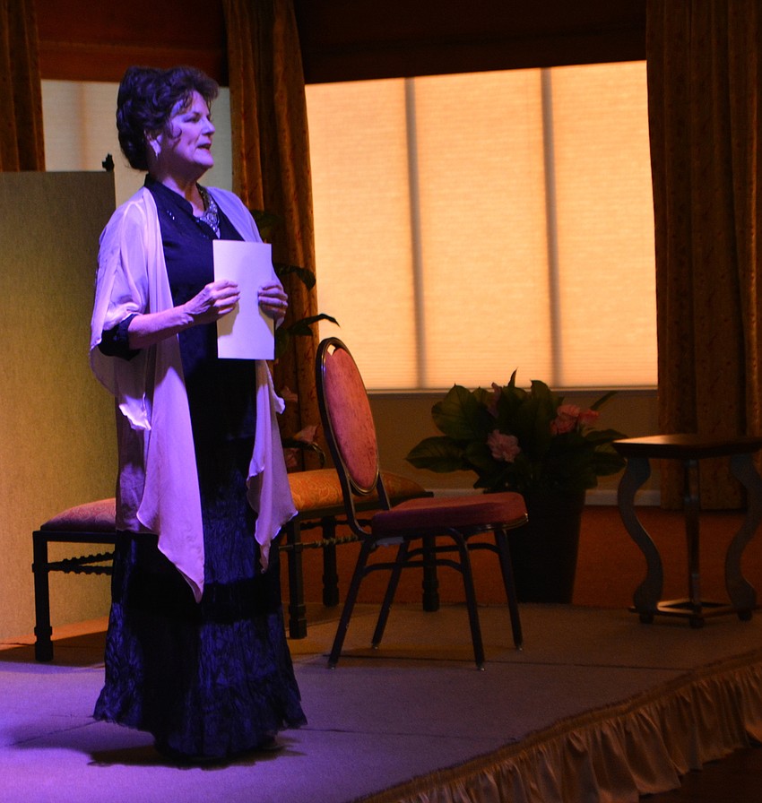 Event co-founder Carol Sparrow addresses the crowd of approximately 100 people.