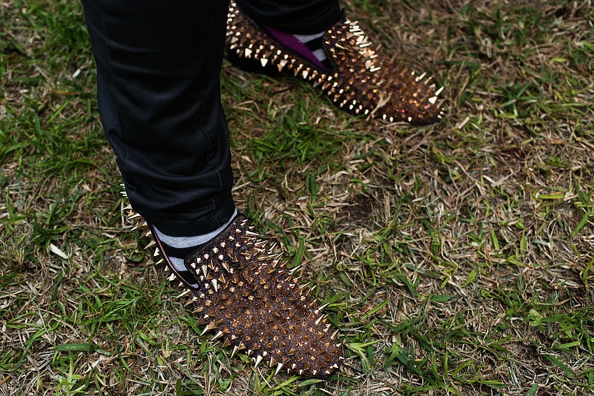 Ryan Nolen sported studded shoes.