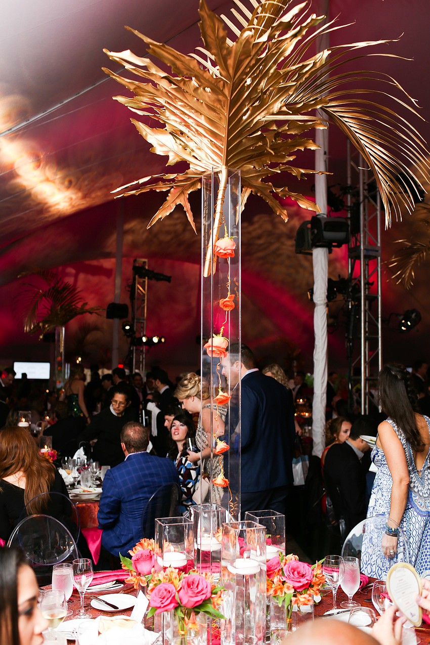 The outer tables had towering centerpieces.