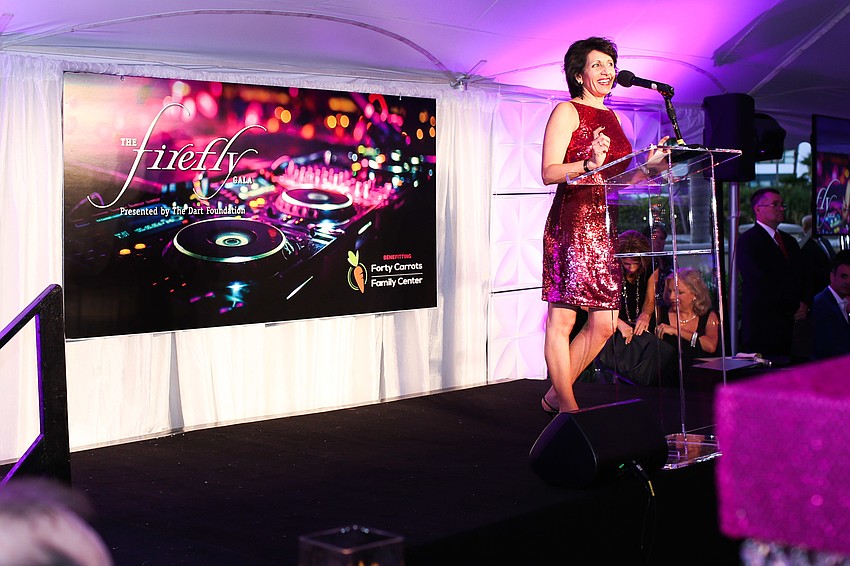 Executive Director Michelle Kapreilian told guests about the mission of Forty Carrots Family Center.