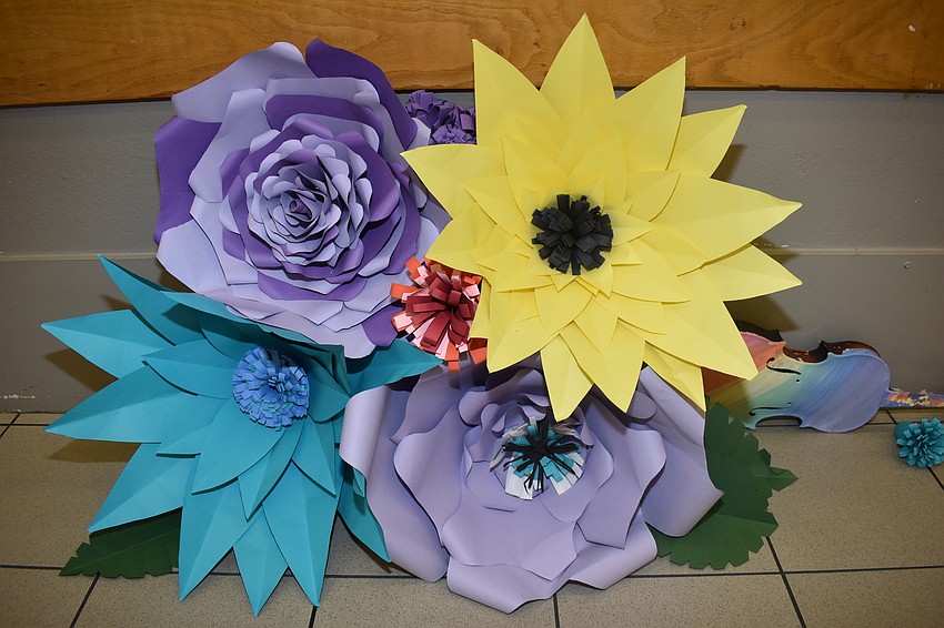 There were handmade paper flower decorations at the reception.