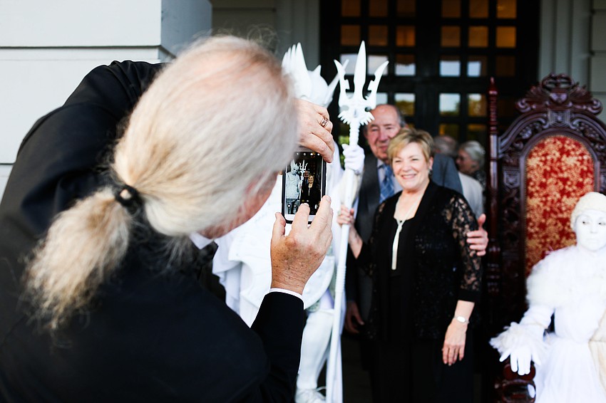 Gary Sweetman takes a photo of Herman Frankel and Managing Director Linda DiGabriele