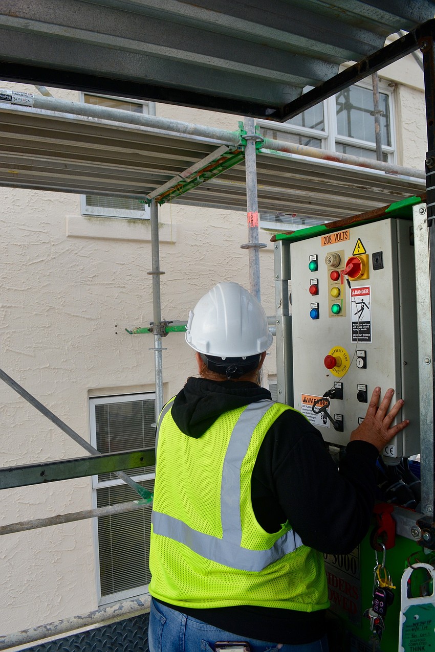 Buck Hoist Operator Amy Ogden takes the 