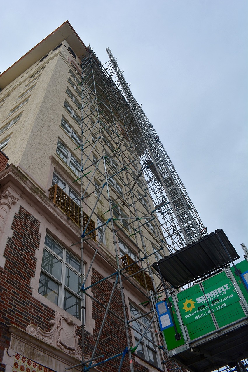 The Terrace Administration Building is completely covered in scaffolding.