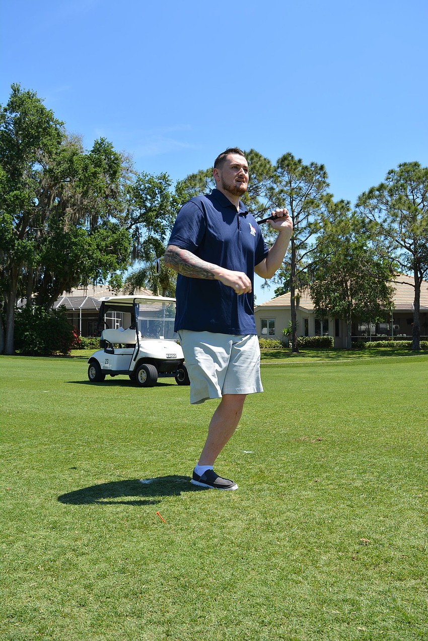 Veteran Stephen Peterson, who will benefit from the 2020 golf tournament at Rosedale, may have gotten help choosing the right club, but he had the best shot of his foursome.