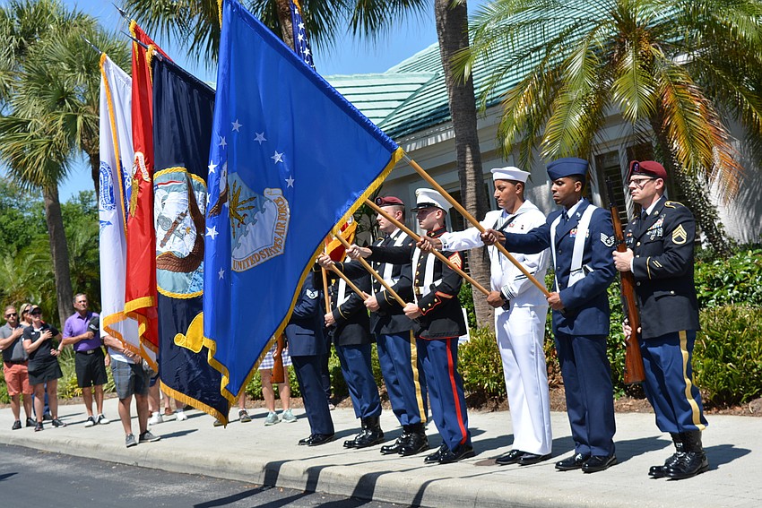 The Honor Guard from MacDill Air Force Base presents colors for the national anthem.