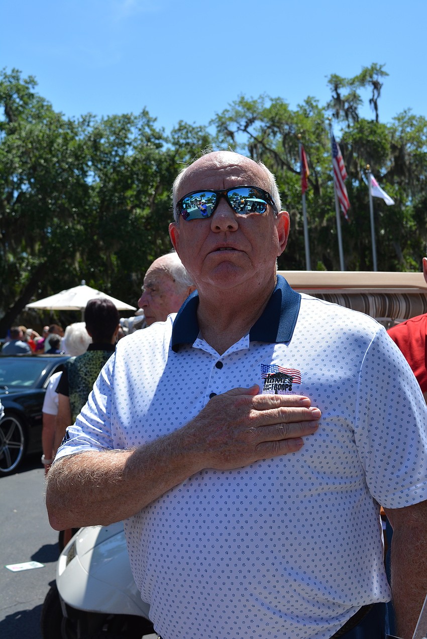 Homes for Our Troops President and CEO Tom Landwermeyer sings the national anthem before participating in the tournament.