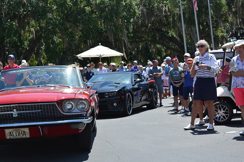 A procession of vehicles, including more than 30 motorcycles, followed the Color Guard from MacDill Air Force Base in for a parade starting the event.