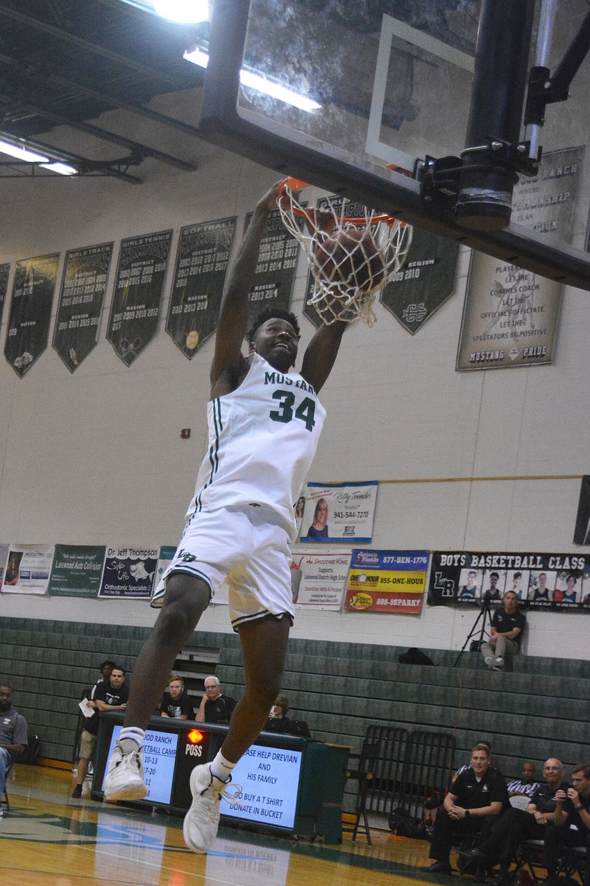 Lakewood Ranch's Josh Young slams it home during the dunk contest, which Young won.