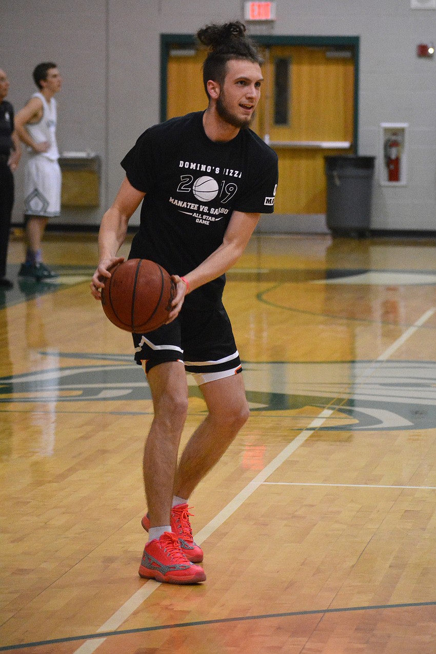 Booker's Hudson Gough preps for the boys 3-point contest.