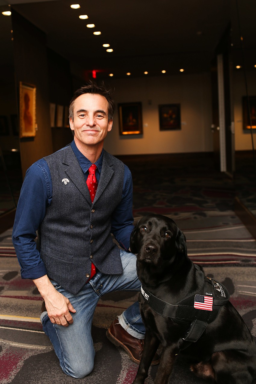 Guest Speaker Keni Thomas and his service dog Keith