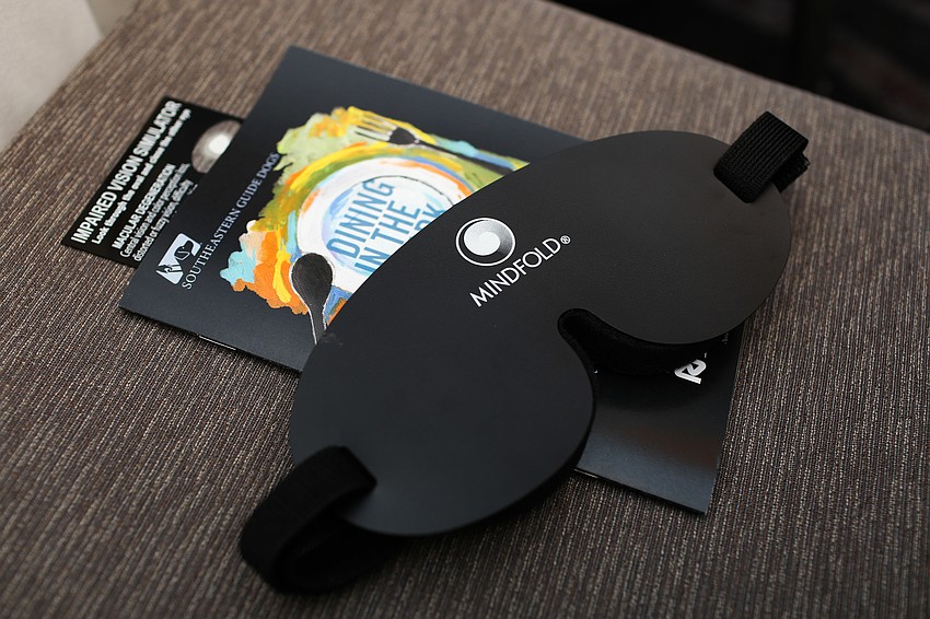 Guests were blindfolded during the main course to experience eating while not being able to see.