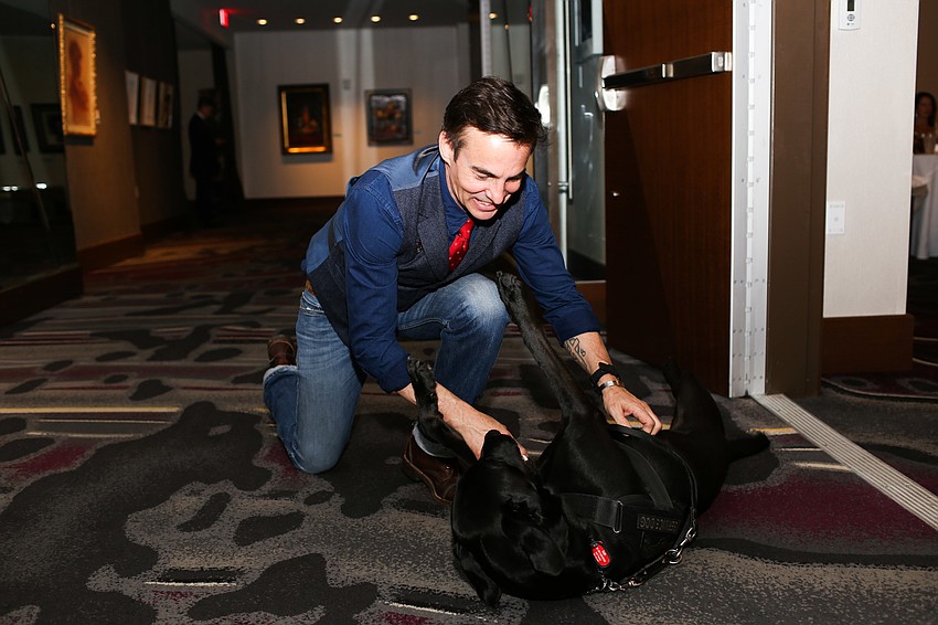 Guest Speaker Keni Thomas and his service dog Keith