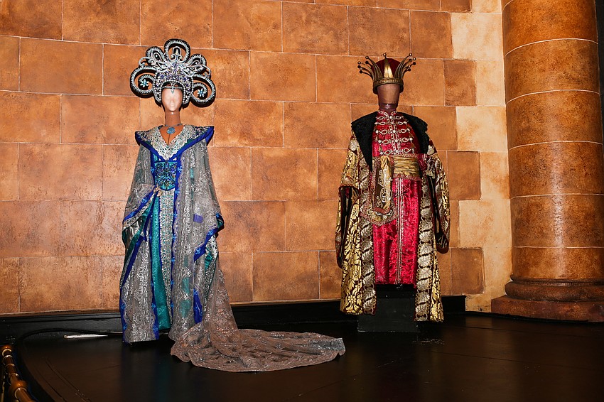 Costumes from the past years were set up around the stage.