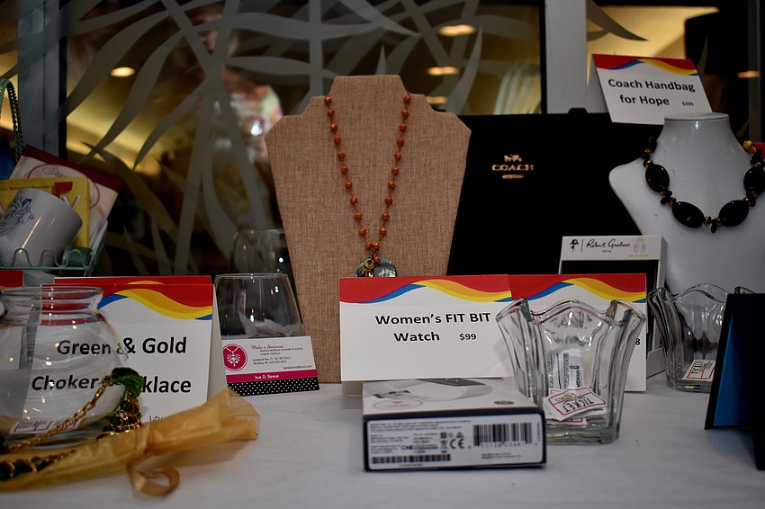 Raffle items include a Fit Bit and jewelry.