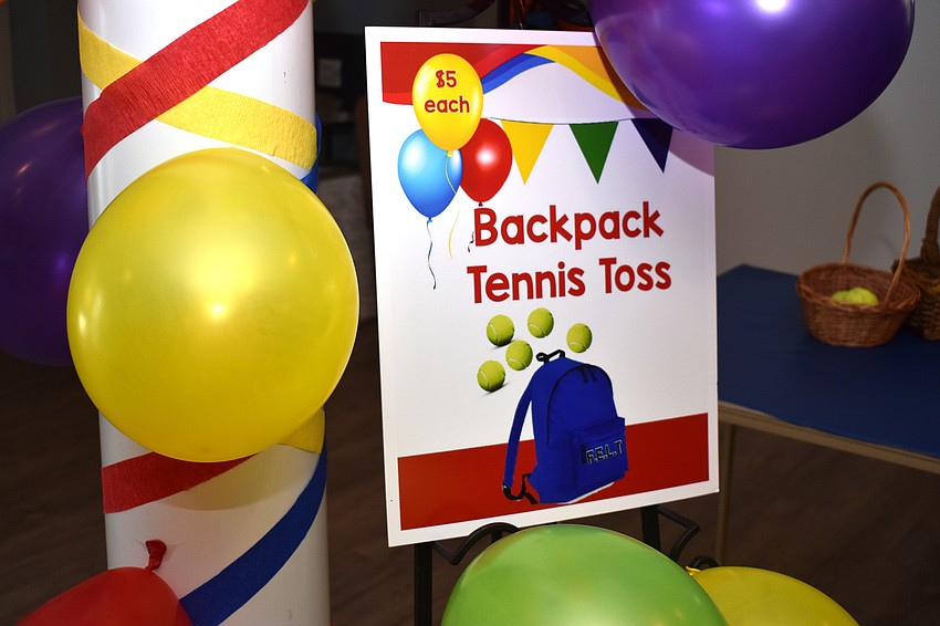 Games, such as Backpack Tennis Toss, provided entertainment all evening.