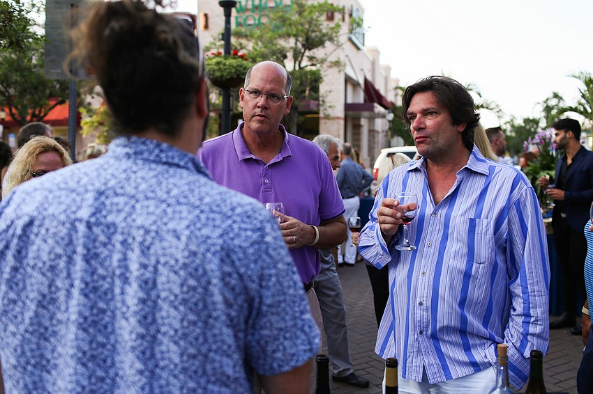Bob Jy and Matthew Sturtevant learn about Christopher Creek Wines from Liam McCormick.