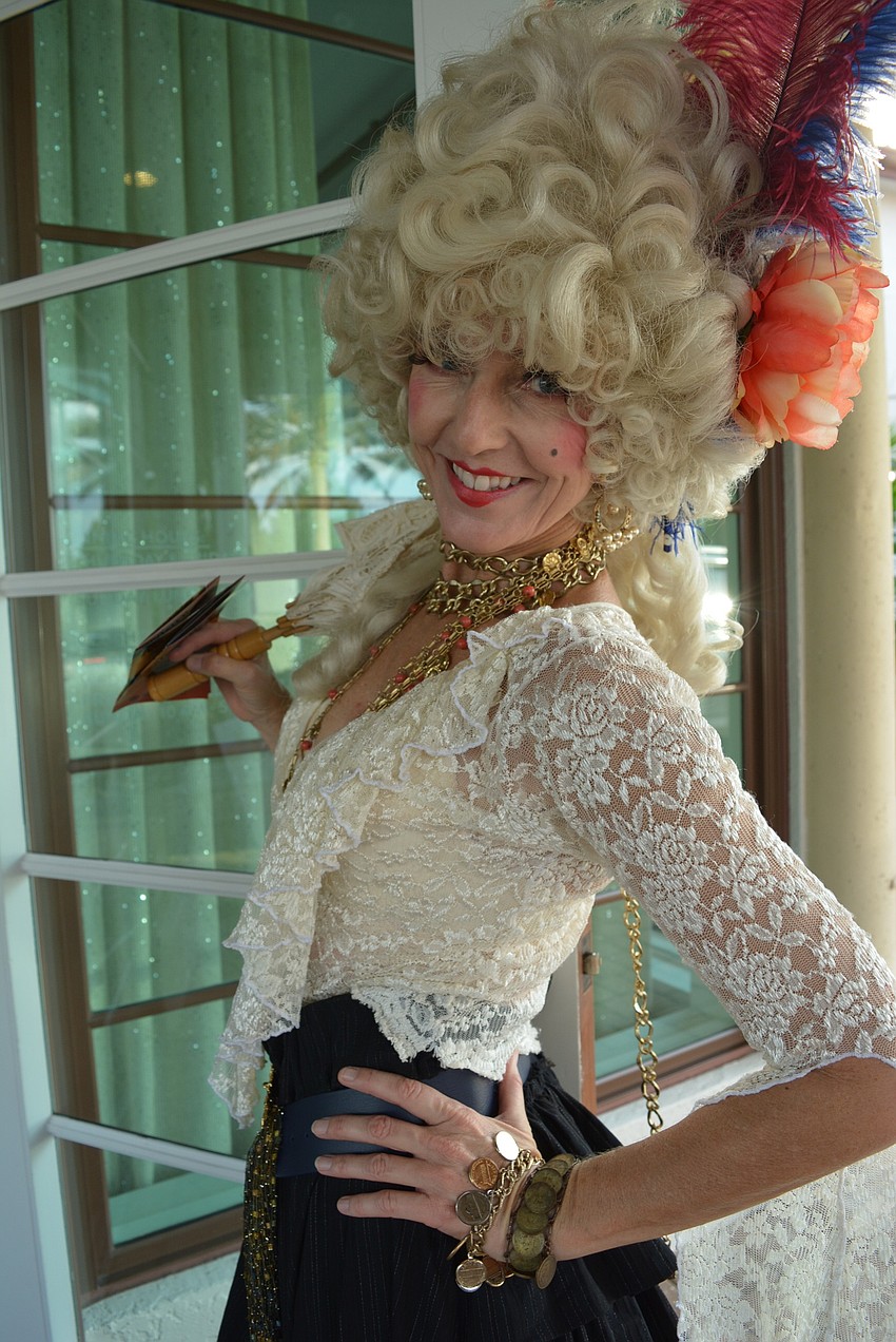 Beverley Barritt, better known as Muriel the pirate wench, greets guests.