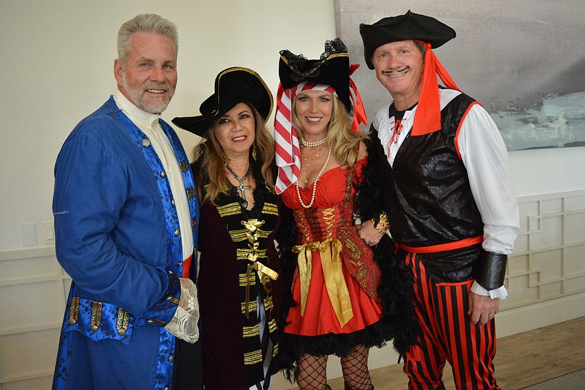 The Concession's Keith and Evella Feldhacker join sponsors Caroline and Lee Wetherington, of Lee Wetherington Homes.