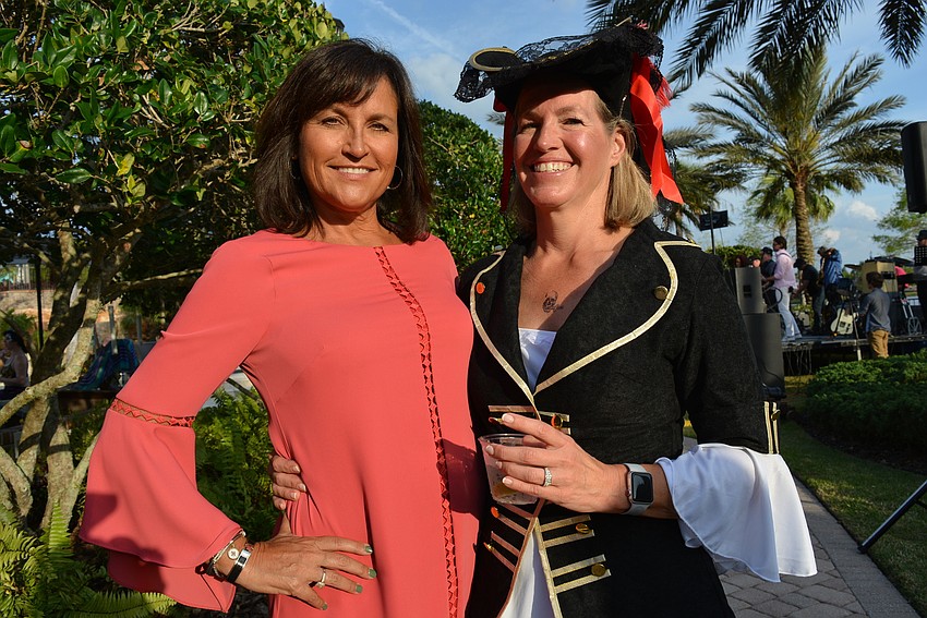 Friends Victoria Herman, of Country Club, and Patty Grossman, of Lake Club, are happy to support the cause.