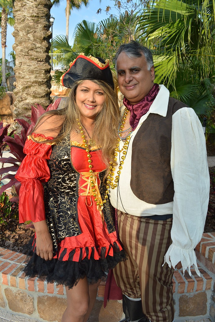 Sandy and Ketan Kapadia, of St. Petersburg, attend with friends Mark and Kris Hungate, not pictured.