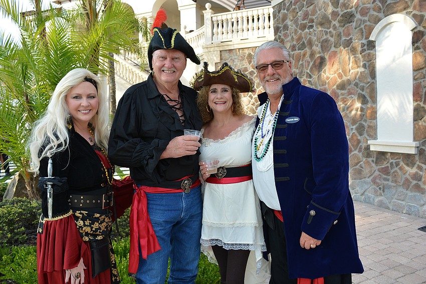 Angela Krajewski, Larry Pulliam, Sandra Carson and Kirk Krajewski are old work colleagues.