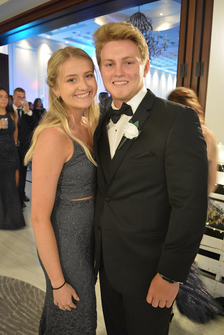 Seniors Hannah Pierce and Jackson Dietz loved seeing photos of friends as a way to decorate for prom. 