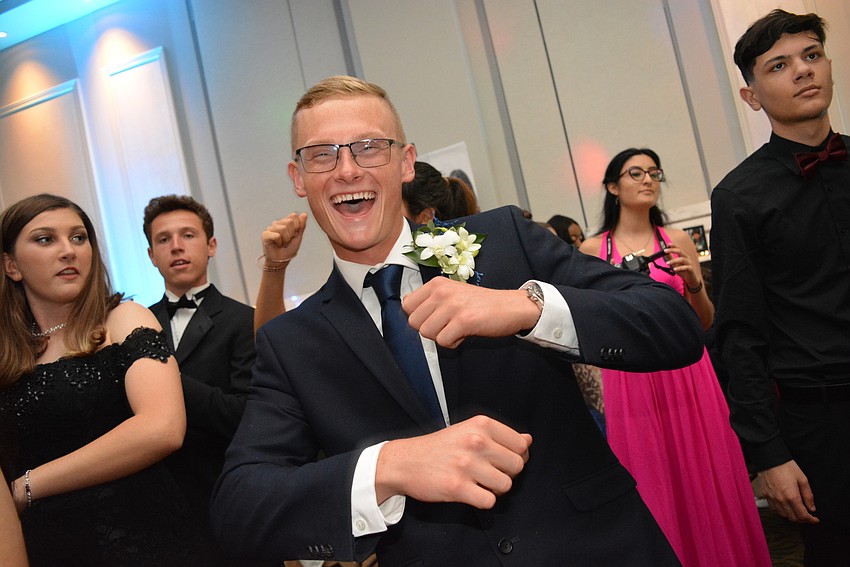 Junior Nicolas Wigington dances to 