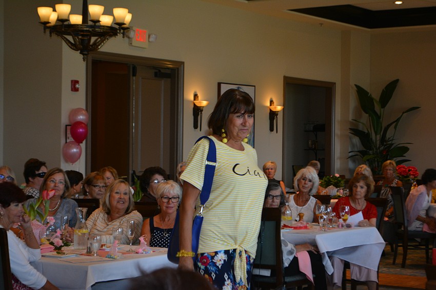 Paulette Gandel is the center of attention as she shows off this summer's fashions.