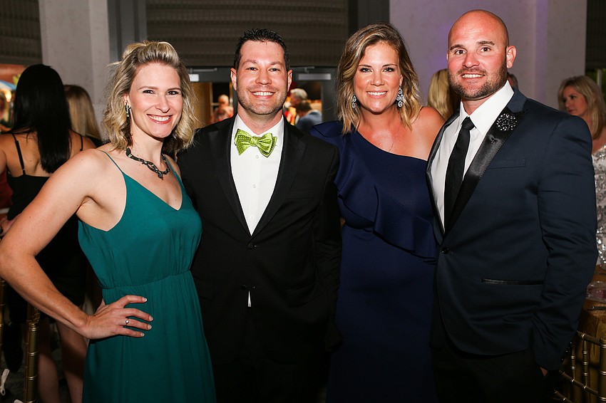 Kat and Adam Hughes with Beth and Ryan Jacobson