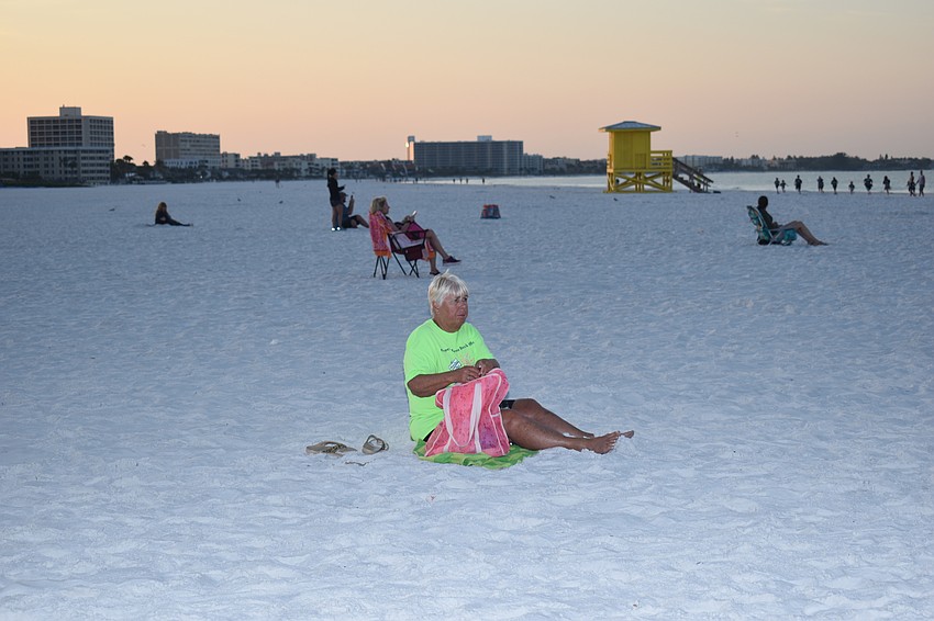 Spectators lined up to watch the race in the early morning.