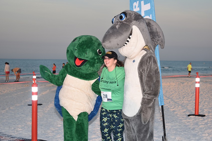 Jill Eisenbeis with the Mote Marine mascots.