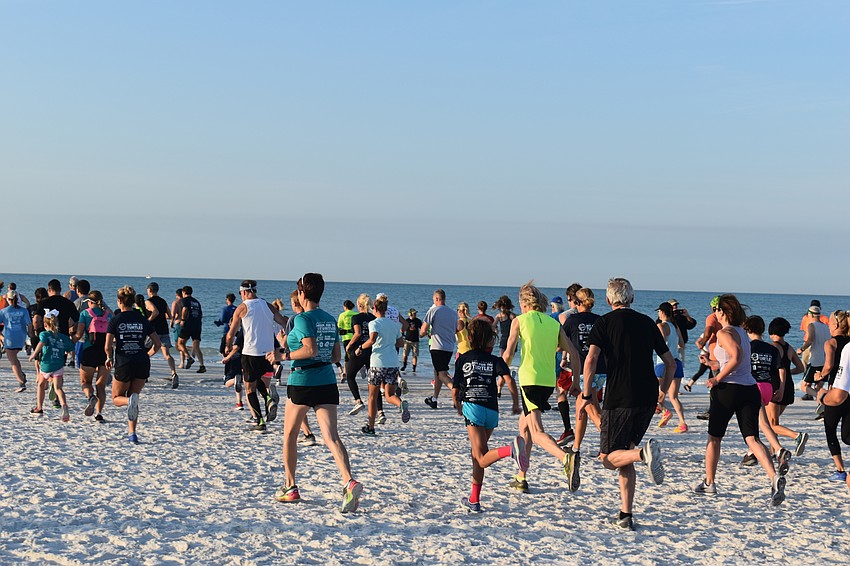 The racers didn't let the early morning or the sand deter them from racing for a good cause.