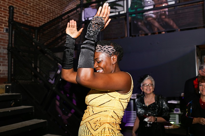 Charlotte Johnson dances for guests.