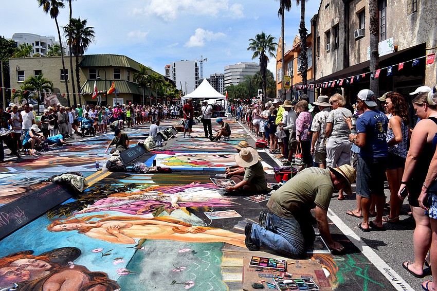 Hundreds of spectators milled around the festival in Burns Square.