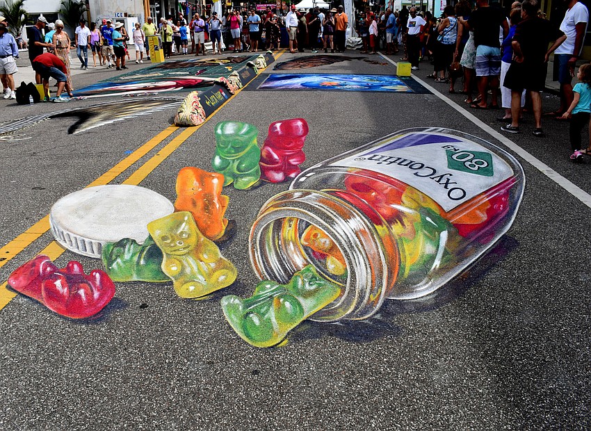 While this 3D piece uses exuberant colors, it portrays a darker subject matter.