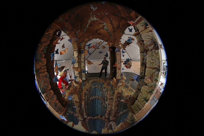 Kurt Wenner, the inventor of 3D Street Painting and 3D Pavement Art Illusion, stands in his piece 