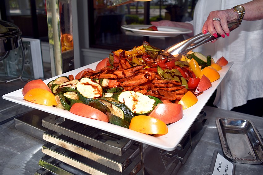 Members of the club had a buffet-style lunch.